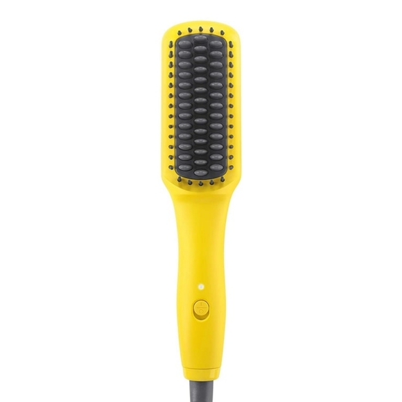 The Drybar Baby Brush Crush Mini Heated Straightening Brush is compact and has a - Picture 3 of 5